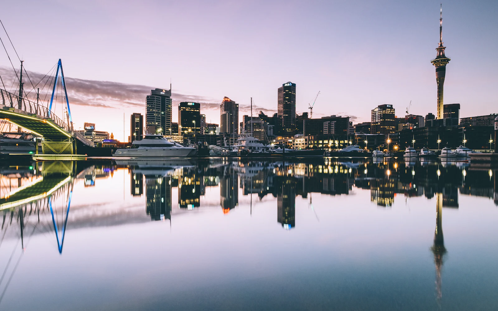 Auckland's waterfront at dusk, the kind of view at the end of an airport transfer